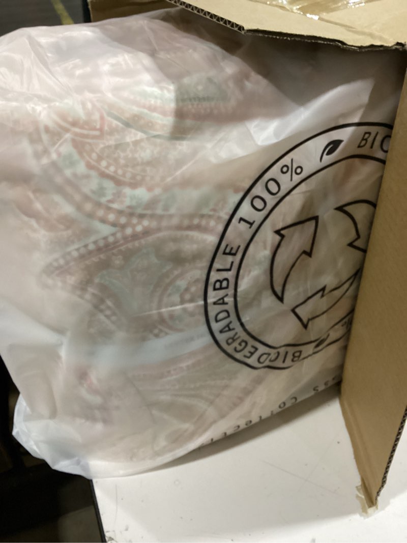 Condition photo showing New/Like New for levtex home - spruce coral quilt set - king/cal king quilt (106x92in.) + two king pillow shams (36x20in.) - paisley pattern in coral and tan - reversible - cotton king coral