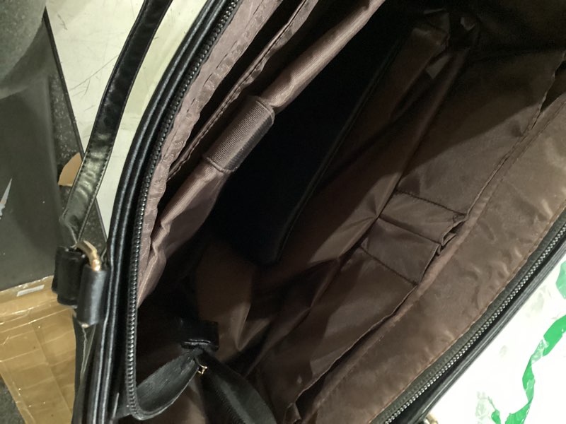 Condition photo showing Good Condition for black faux leather purse 