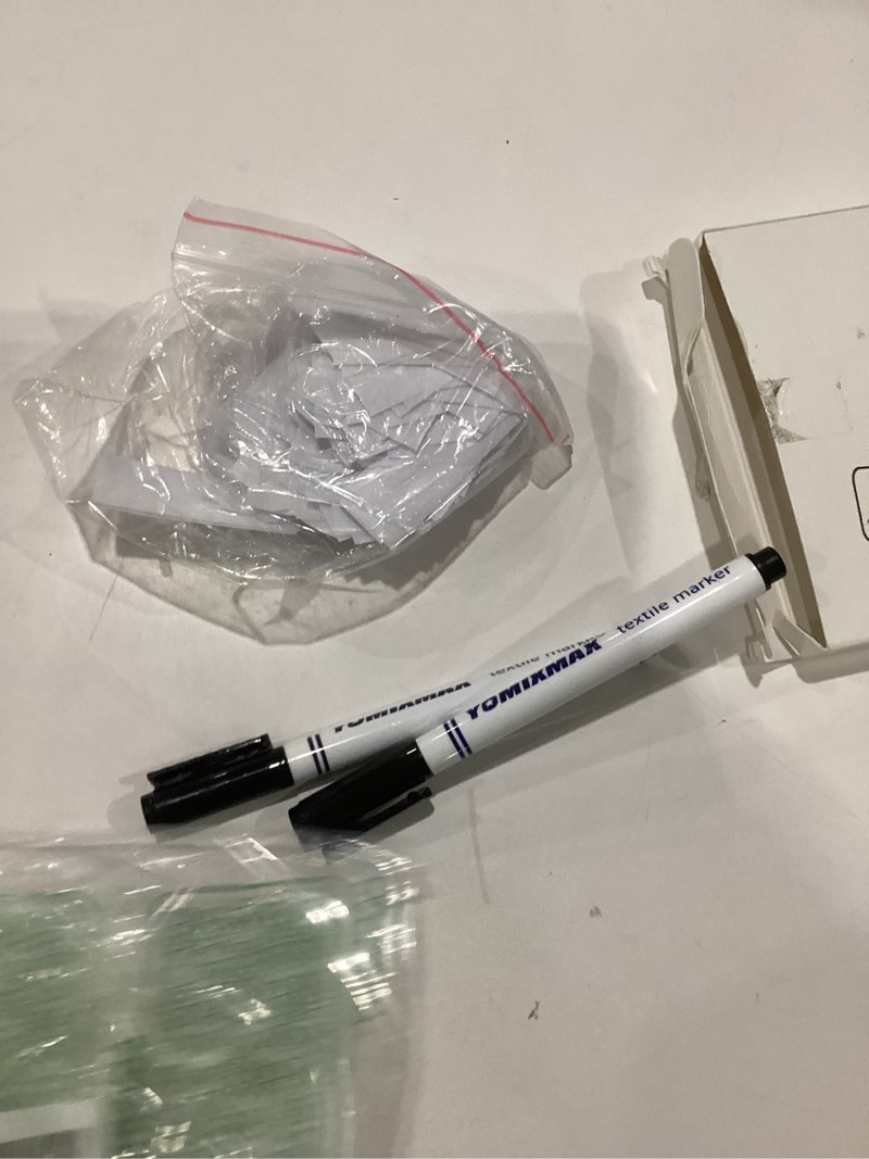 Condition photo showing As Is for tatuo 200 pieces iron on name tags for clothing, clothing labels for nursing home, name fabric labels tags with permanent marker for nursing home college camp day care uniforms