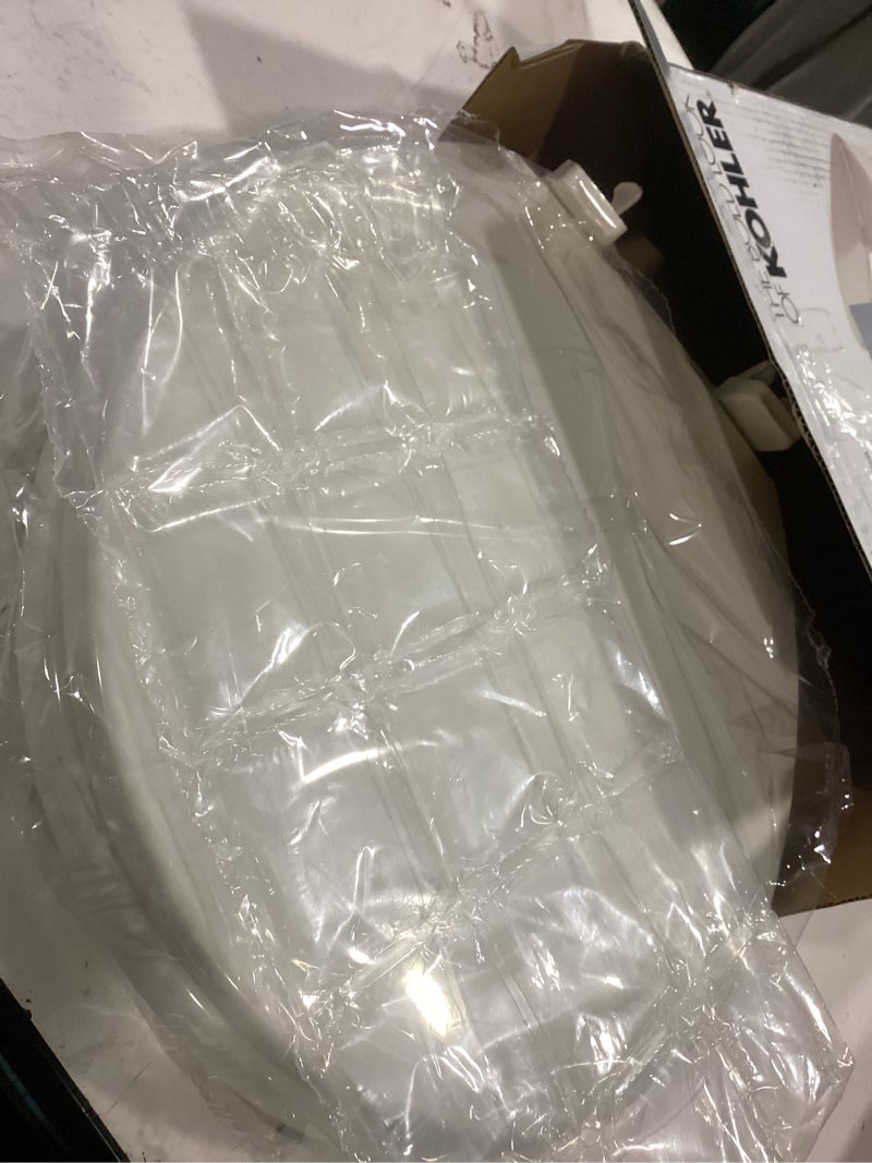 Condition photo showing As Is for kohler 25876-96 hyten 3" height, elevated soft close round toilet seat, contoured seat with grip-tight bumpers, quick-attach hardware, biscuit biscuit round