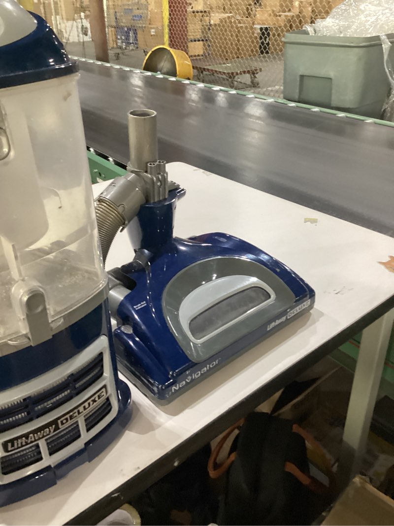 Condition photo showing As Is for Shark Upright Vacuum, Navigator Lift-Away Deluxe with Large Dust Cup Capacity, HEPA Filter, Swivel Steering, Upholstery Tool & Crevice Tool, Blue, NV360 Navigator (Navy)