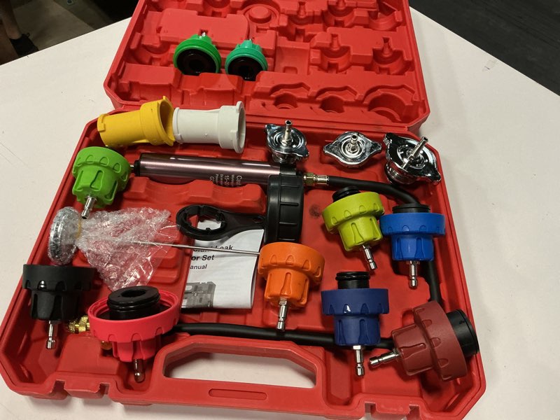 Condition photo showing Good Condition for 18pcs radiator pump pressure tester kit, pressure leak tester tool kit for automotive cooling system water tank leakage detection red 1 18