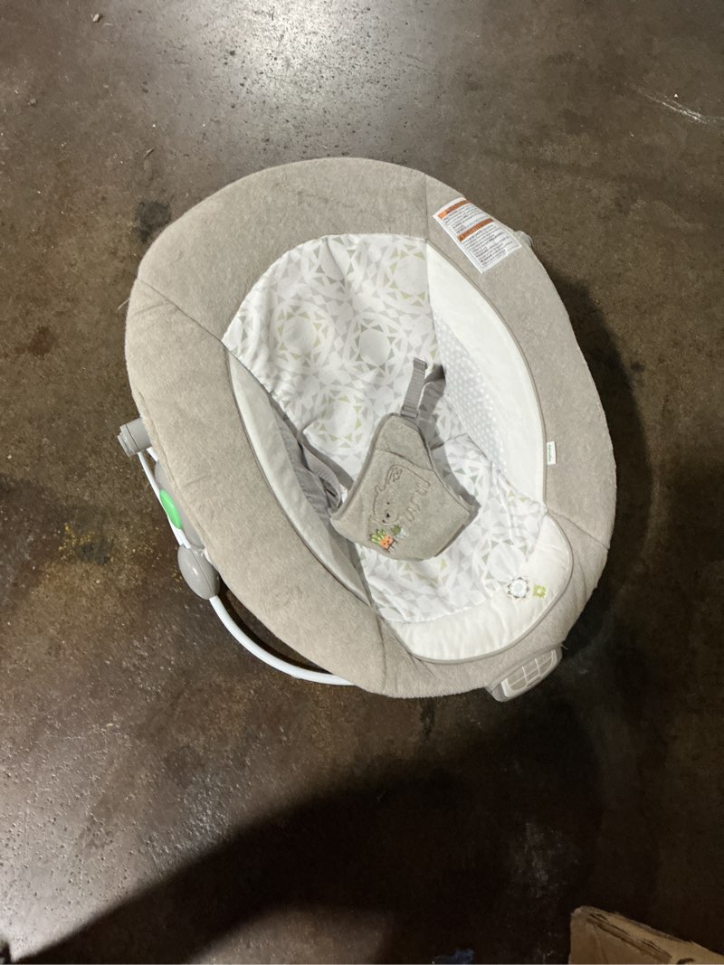 Condition photo showing As Is for Ingenuity InLighten Baby Bouncer Infant Seat with Light Up -Toy Bar, Vibrations, Tummy Time Pillow & Sounds, 0-6 Months Up to 20 lbs (Twinkle Tails Bunny)
