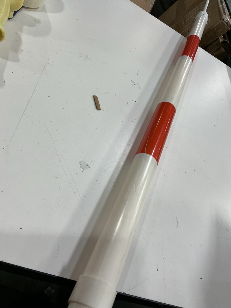 Condition photo showing As Is for roadhero 1 pack 4 ft to 6.9 ft retractable cone bar, expandable traffic cone bars for parking lots, extendable barricade for road construction, white and red, cone not included 1 pack red/white