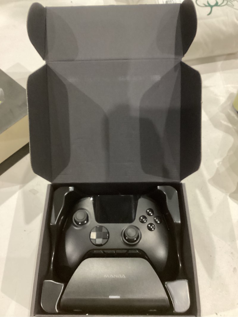 Condition photo showing Good Condition for manbaone interactive screen wireless gaming controller for pc/switch/switch 2/ios/android,hall effect stick & trigger,rgb lighting,remappable buttons,1800mah with charging dock (black)