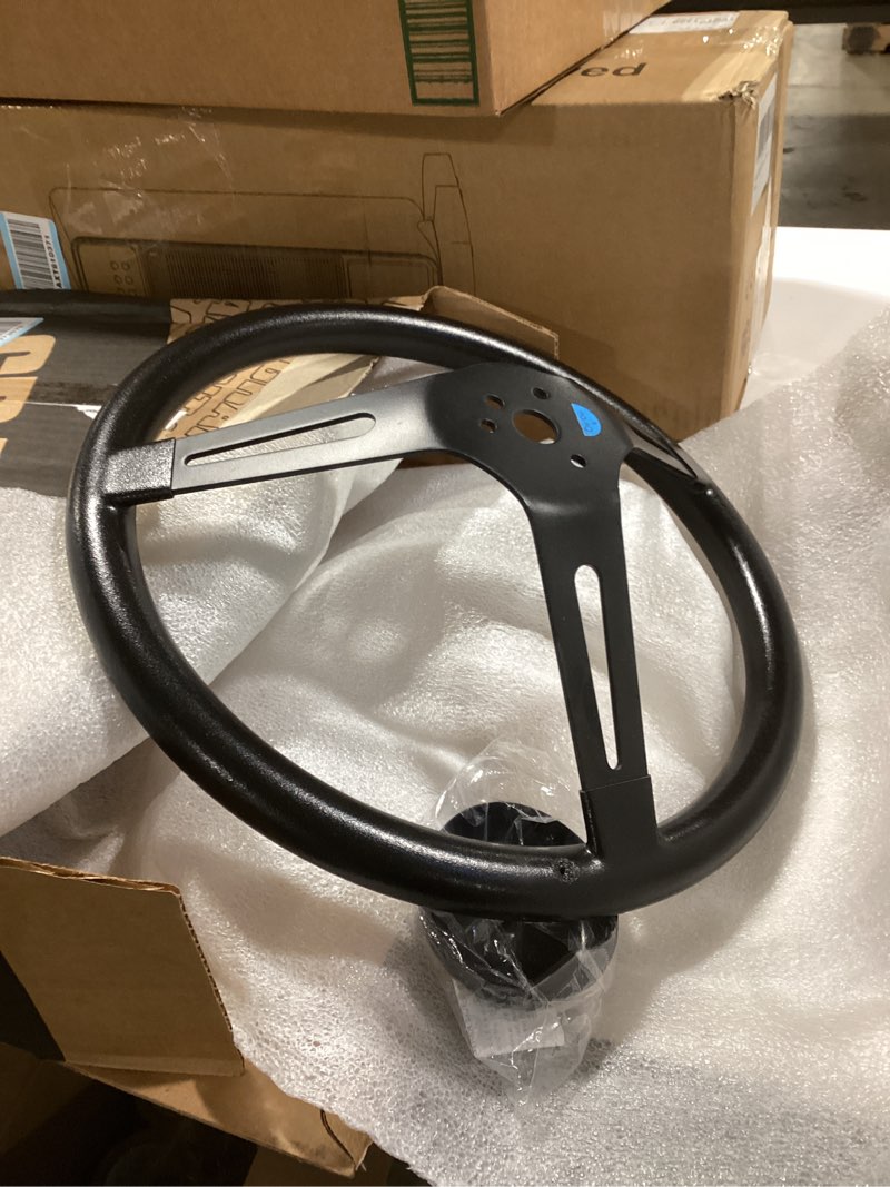 Condition photo showing Good Condition for Grant 8540 Classic Series 13.5 inch Black 3-Slotted Black Spoke Steering Wheel