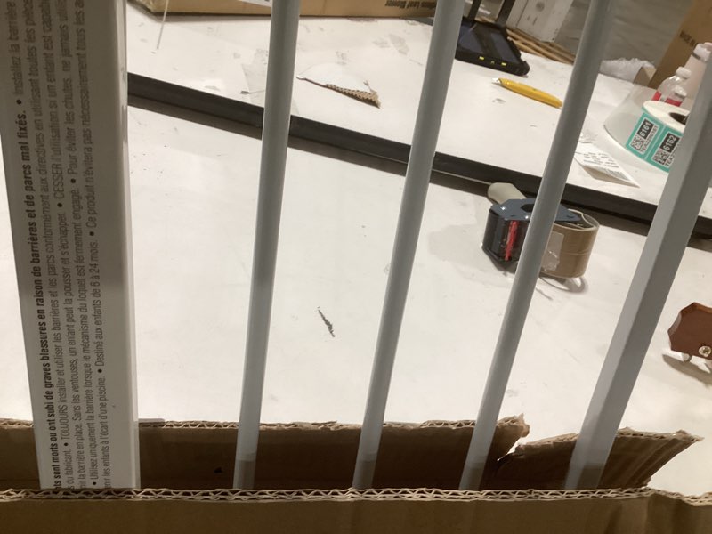 Condition photo showing New/Like New for Regalo Easy Step Extra Tall Walk Thru Baby Gate, Includes 4-Inch Extension, and 4 Pack of Wall Cups and Mounting Kit, White White 29-36.5"W x 36"H