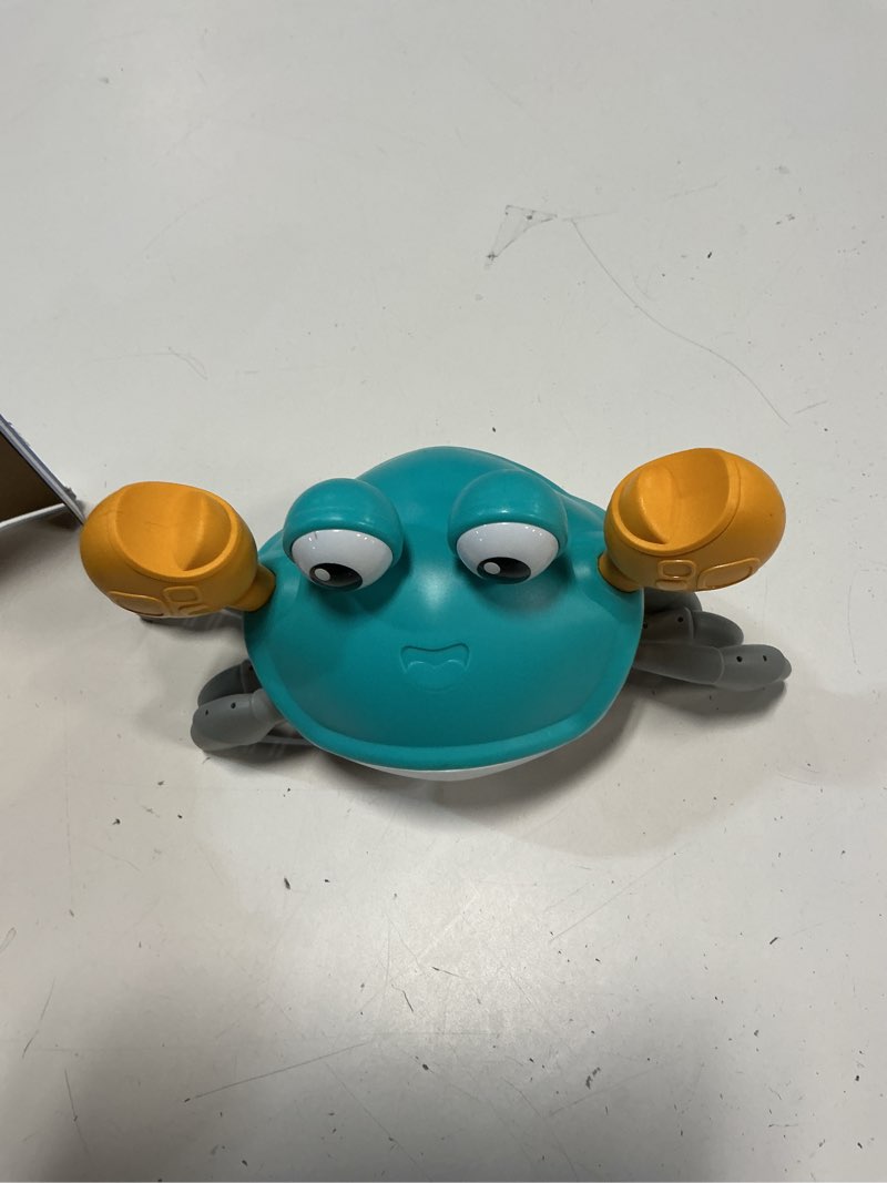Condition photo showing Good Condition for kifunppy crawling crab baby toy for 1 year old boys girls, tummy time toys with music and lights automatically avoid obstacles, walking crab toy for toddlers ages 6+ months
