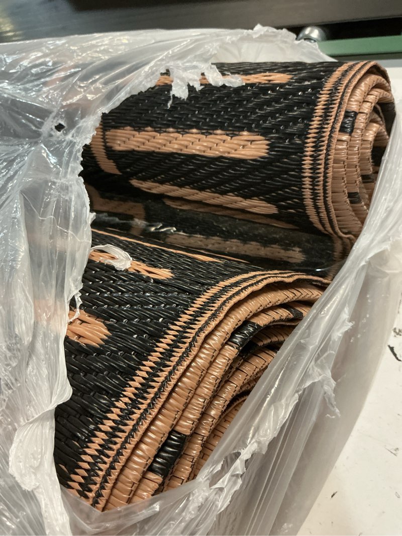 Condition photo showing Good Condition for wonnitar 9x12 outdoor rug, large waterproof reversible outdoor patio area rug, indoor/outdoor plastic straw portable camping rug for outside rv balcony garden deck, black & brown 9' x 12' (rectangular) black & brown