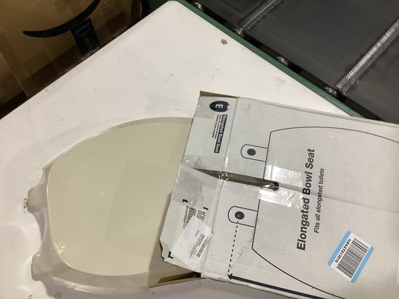 Condition photo showing New/Like New for kohler french curve ready latch quiet-close elongated toilet seat contemporary biscuit elongated
