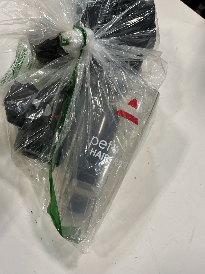 Condition photo showing As Is for Bissell Pet Hair Eraser Cordless Hand Vacuum, Home, Auto, and Pet Vacuum, Crevice Tool, Upholstery Tool, and Motorized Brush Included, 1782 Hand Vacuum Only