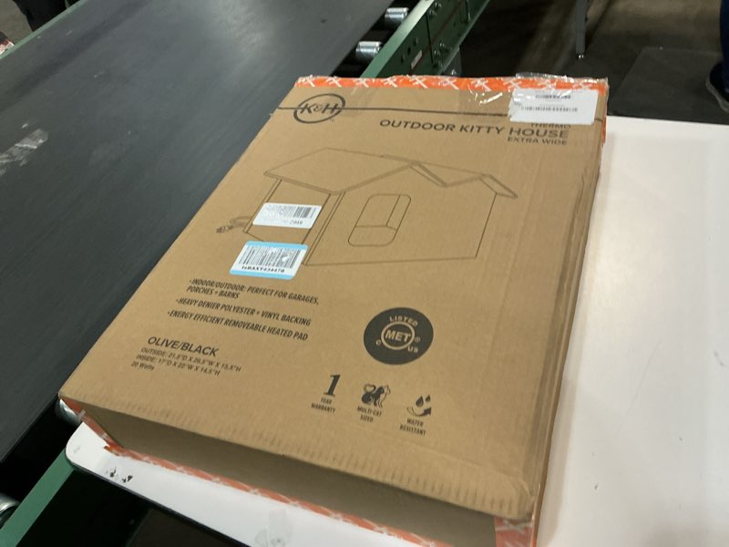 Condition photo showing Good Condition for K&H Pet Products Extra-Wide Heated Cat House for Outside, Outdoor Cat House with 2 Safe Escape Doors, Weatherproof Insulated Stray & Feral Shelter with Waterproof Heated Bed, Safety Listed - Olive