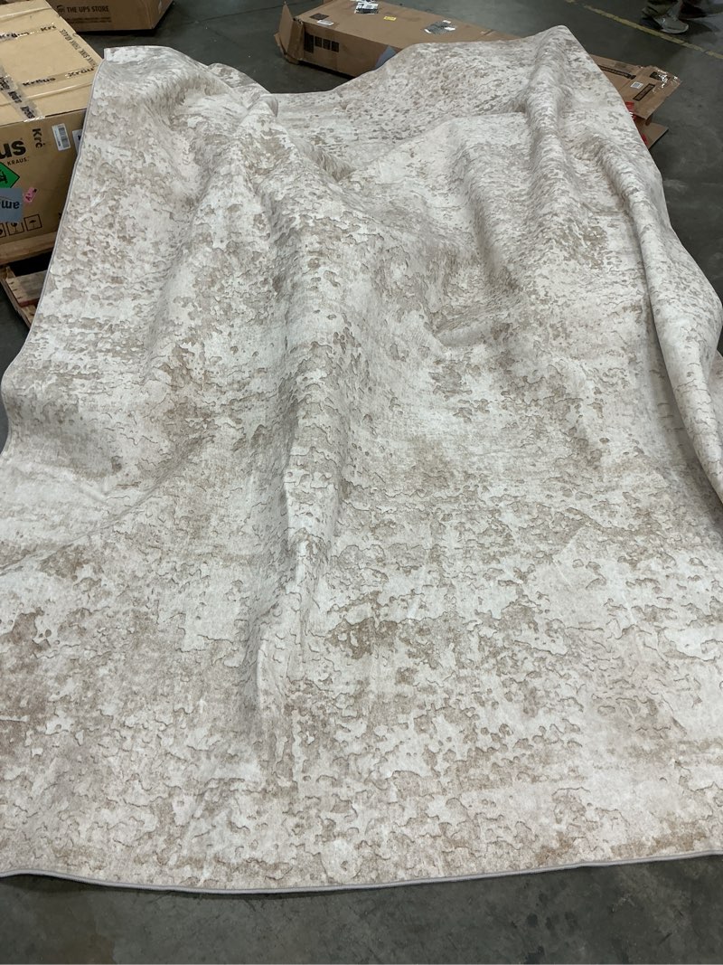 Condition photo showing As Is for 10x14 washable area rug beige vintage