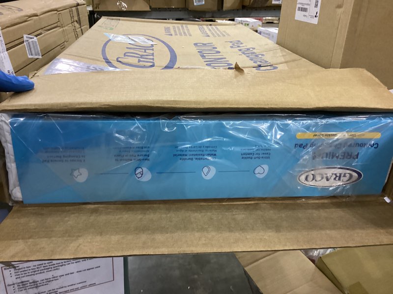 Condition photo showing New/Like New for Graco Premium Contoured Changing Pad – GREENGUARD Gold Certified, Water-Resistant, Ultra-Soft Buckle Cover, Contoured Baby Changing Pad, Fits Most Standard-Size Changing Toppers, Non-Skid Bottom