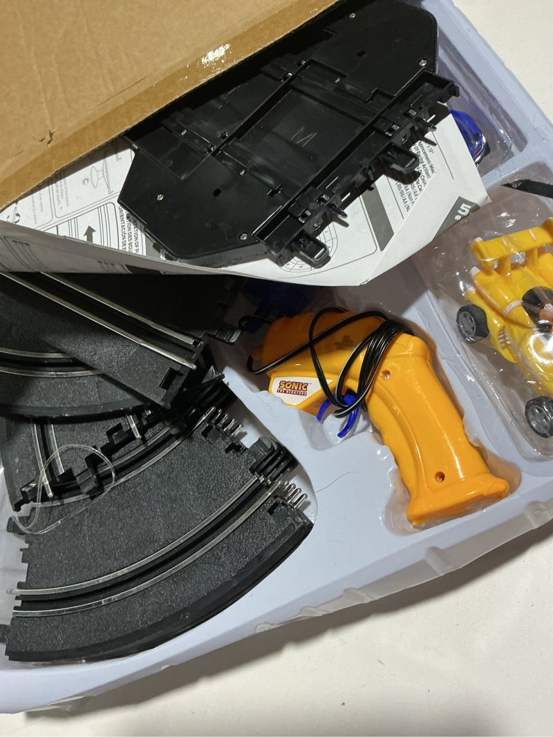 Condition photo showing As Is for nkok sonic & tails rc slot car set race set vehicle, black, cars rase on figure-8 track, features a lap counter, perfect item for kids, ages 5 and up