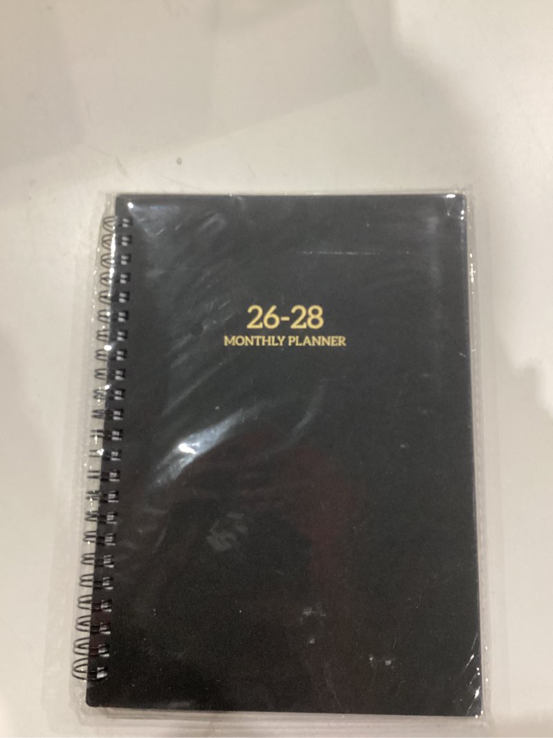 Condition photo showing New/Like New for 2026-2028 Monthly Planner/Calendar - 3 Year Monthly Planner 2026-2028, Jan. 2026 - Dec. 2028, 6.3" x 8.4", monthly planner with Spiral Bound, Notes Pages, 36-Month Tabs, Inner Pocket, 3 Year Calendar