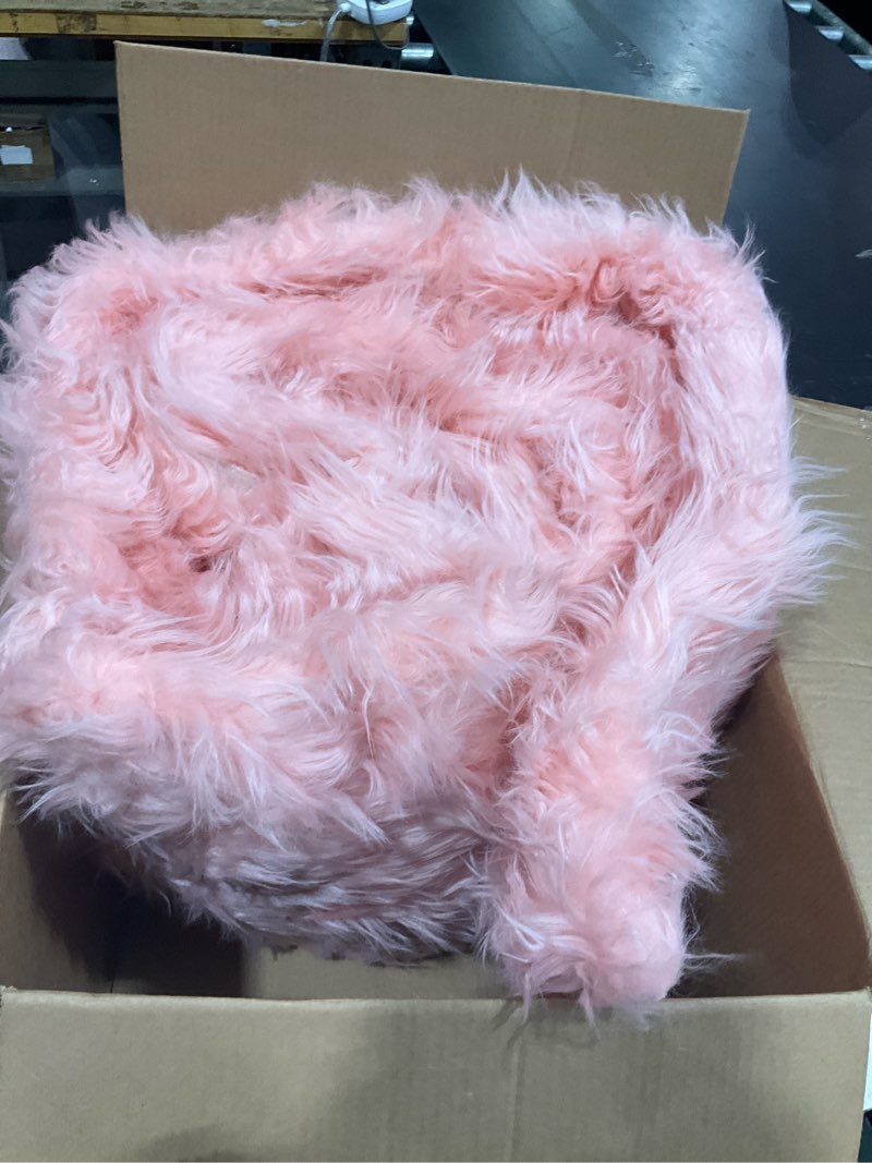 Condition photo showing As Is for fluffy pink faux-fur home accent piece featuring an ultra-shaggy
