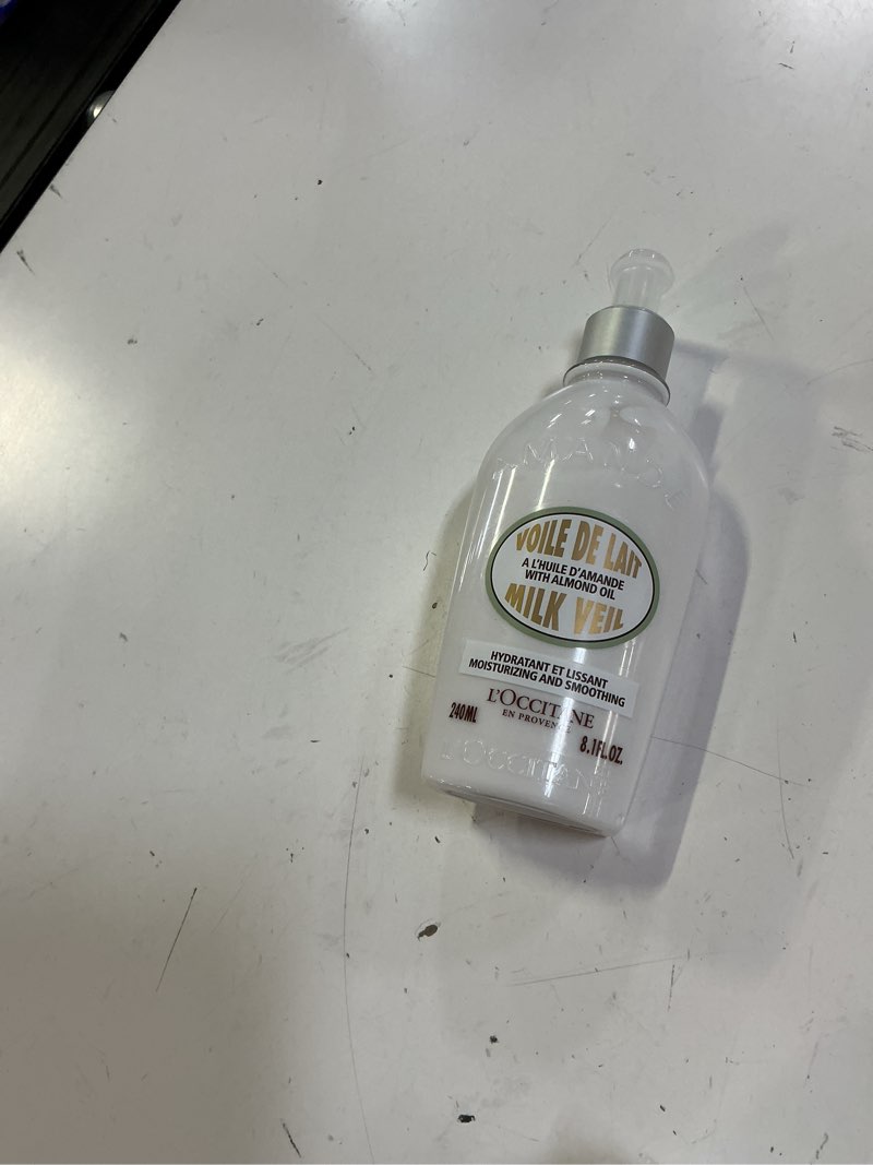 Condition photo showing New/Like New for l'occitane almond milk veil 8.00 fl. oz
