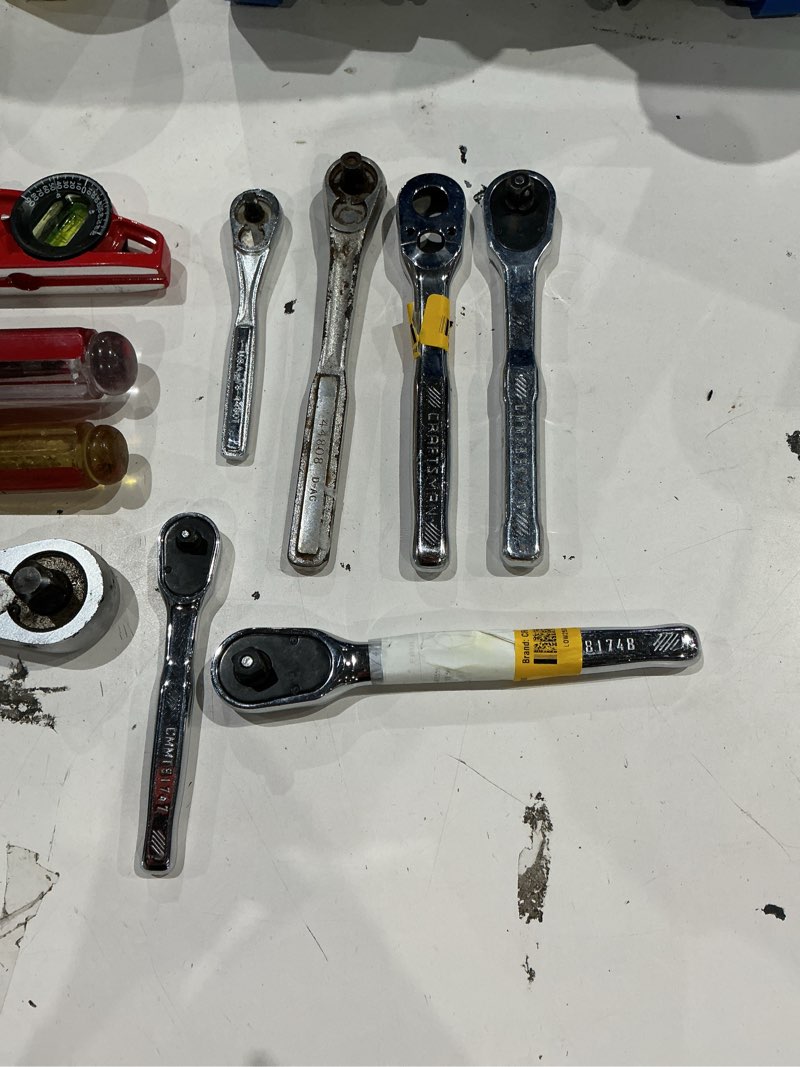 Condition photo showing As Is for assorted home improvement lot (small tools, screw, home accessories, etc.)