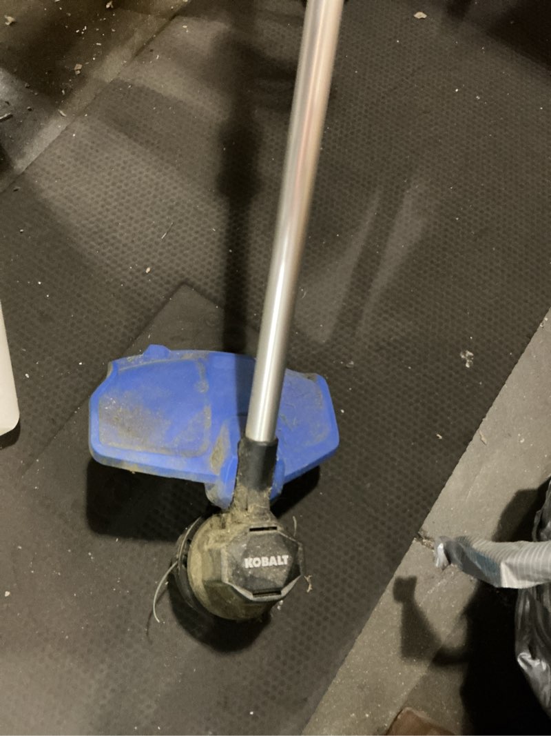Condition photo showing As Is for kobalt gen4 40-volt 15-in straight shaft attachment capable battery string trimmer edger conversion capable 4.0 ah (battery included) (charger included)