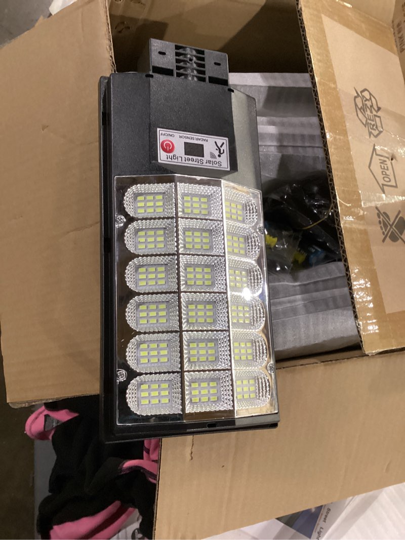 Condition photo showing New/Like New for Solar Street Lights Outdoor, Waterproof Motion Sensor Solar Lights with Remote Control, 6500K Dusk to Dawn Parking Lot Flood Light for Outside Garage Yard, 6 Pack Black 6PCS