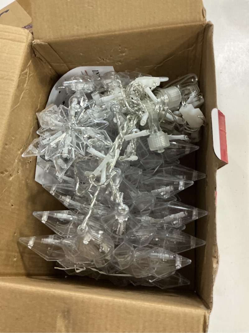 Condition photo showing Good Condition for christmas snowflake lights outdoor,8.2 ft 144 led snowflake icicle lights with 12 drops,8 modes timer waterproof connectable xmas light for eaves,windows,curtain,indoor outdoor(blue white) blue white 144led