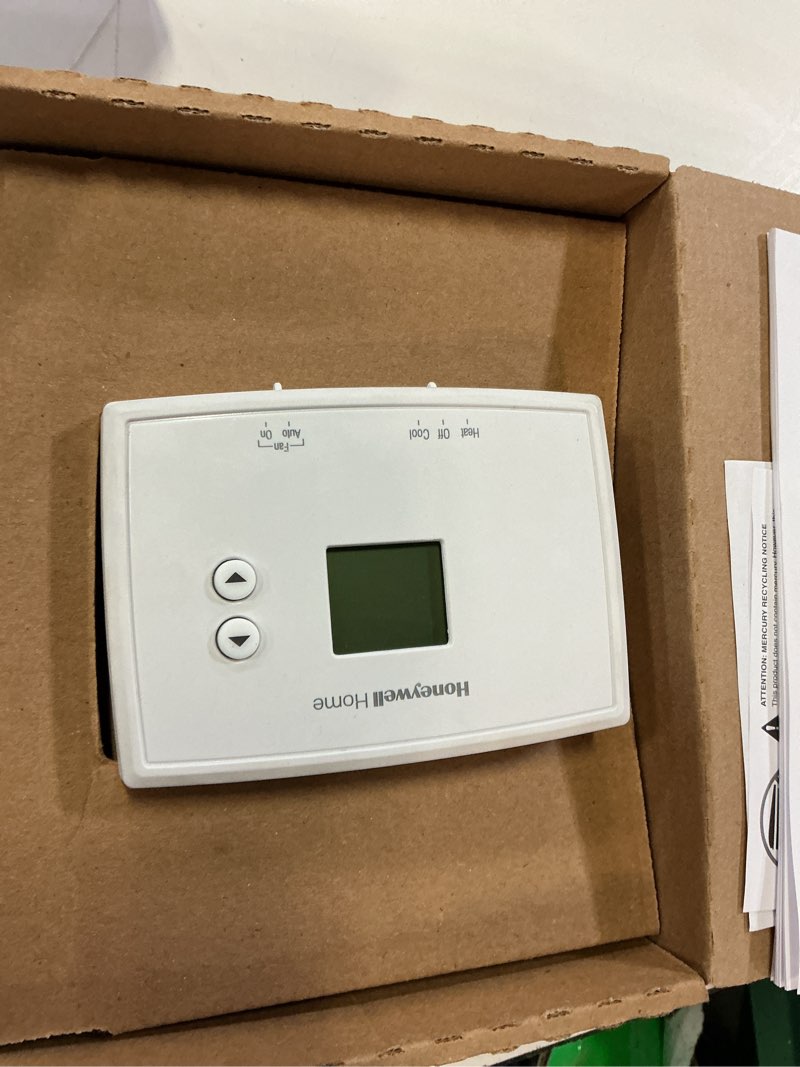 Condition photo showing As Is for horizontal non-programmable thermostat