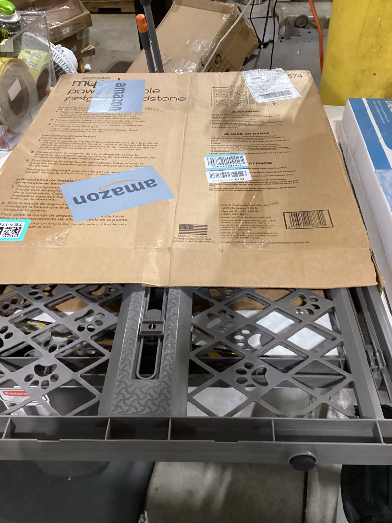 Condition photo showing New/Like New for mypet north states paws portable pet gate: 26-40" wide. pressure mount. no tools needed. made in usa, 23" tall, expandable, durable dog gates for doorways, fieldstone gray