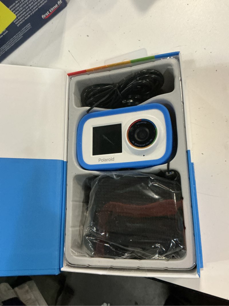 Condition photo showing New/Like New for polaroid dual screen wifi action camera 4k 18mp, waterproof sports polaroid camera with built in rechargeable battery and mounting accessories for vlogging, sports, traveling, home videos