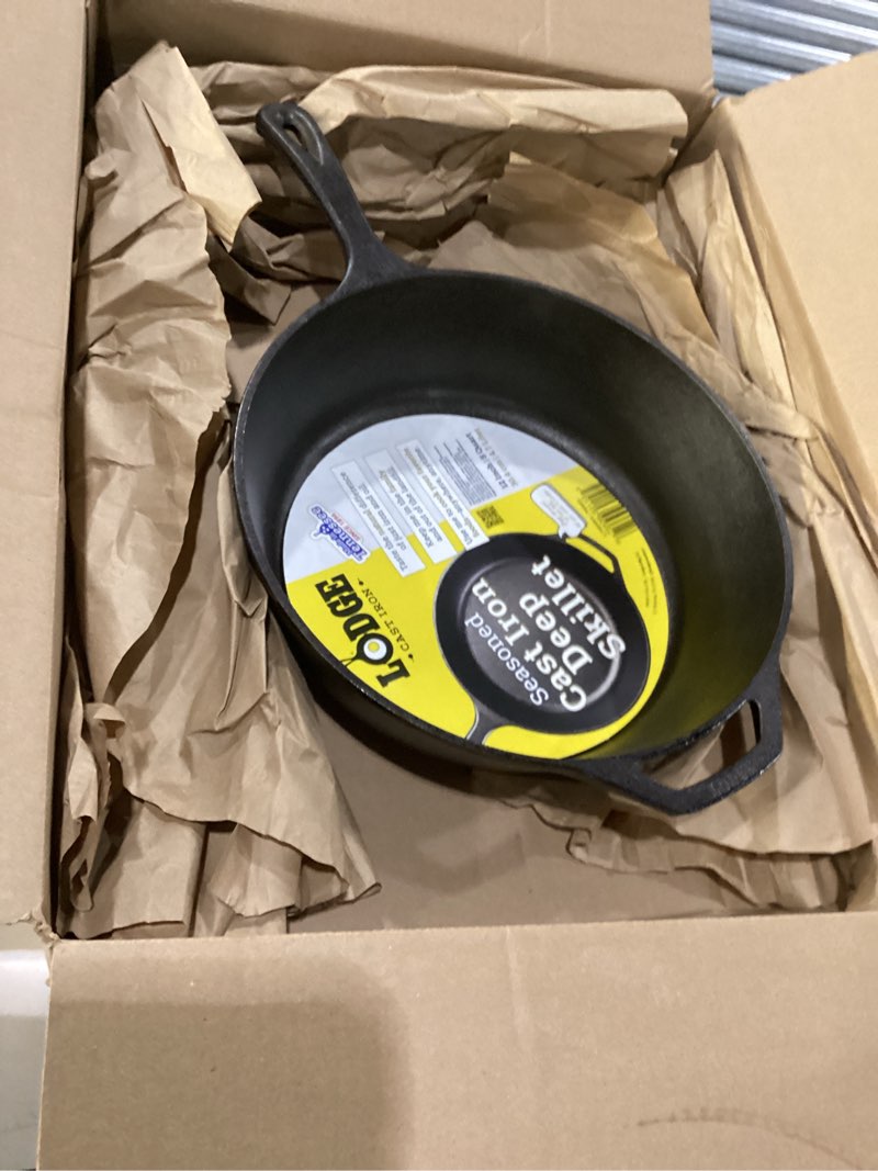 Condition photo showing New/Like New for Lodge 5 Quart Pre-Seasoned Cast Iron Deep Skillet - Signature Teardrop Handle & Assist Handle - Use in the Oven, on the Stove or Grill, or Over a Campfire - Black 5 Quart Iron Deep Skillet