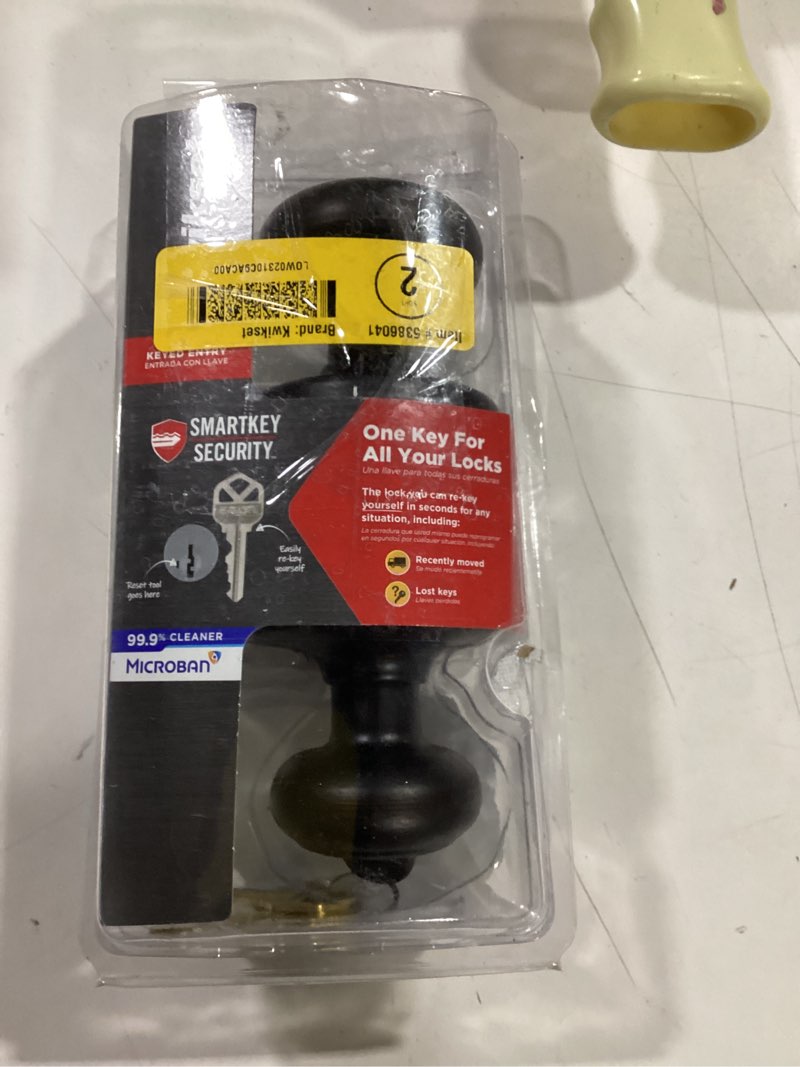 Condition photo showing As Is for Kwikset Cove Venetian Bronze Exterior Keyed Entry Door Knob ft. SmartKey Security