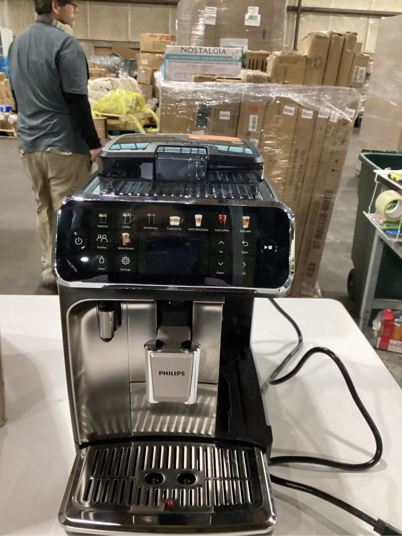 Condition photo showing As Is for PHILIPS 5500 Series Fully Automatic Espresso Machine, LatteGo Milk System, Integrated Grinder, 20 Hot & Iced Coffee Pre-Sets, Quick Start, SilentBrew, 15-Bar Pressure, Black Chrome (EP5544/94) Black, chromed