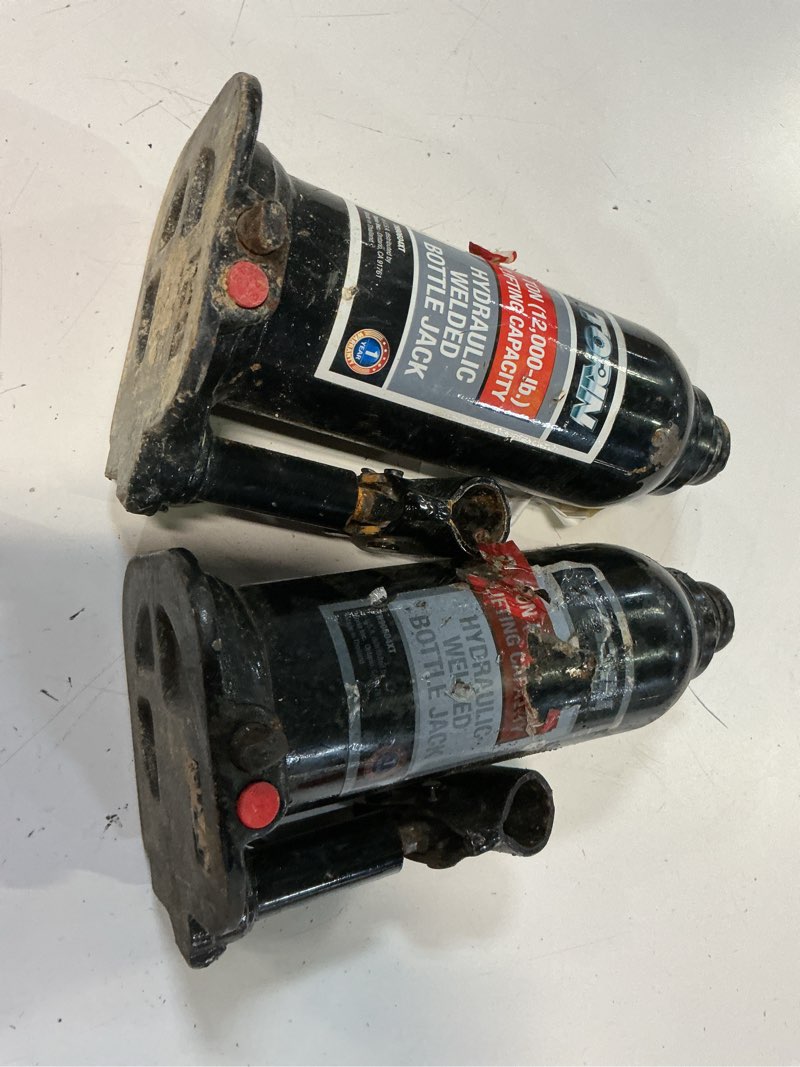Condition photo showing As Is for torin black 12-ton steel hydraulic bottle jack