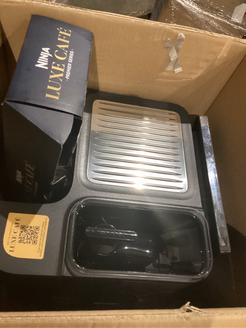 Condition photo showing As Is for Ninja Luxe Café 3-in-1 Espresso, Drip Coffee and Cold Brew Machine | Integrated Coffee Grinder, Milk Frother, Assisted Tamper & Built-In Espresso Accessory Storage | Stainless Steel | ES601 Luxe Cafe Stainless Steel