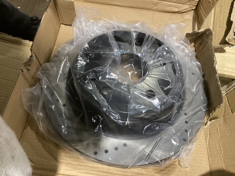 Condition photo showing New/Like New for rear brake pads and rotors kit for 2005-2010 dodge ram 1500, 2011-2018 ram 1500, 2004-2009 dodge durango, 2007-2009 chrysler aspen ceramic brake pads drilled and slotted e-coating disc brake rotors rear brake rotors and pads