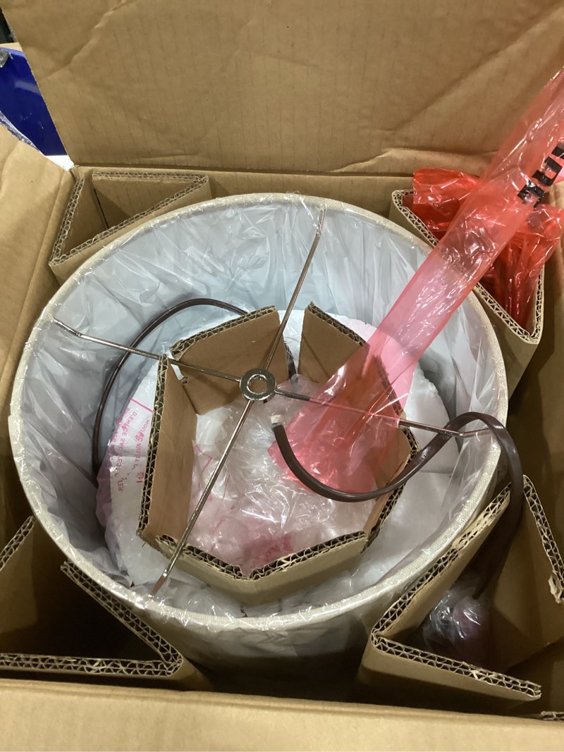 Condition photo showing New/Like New for signature design by ashley rainermen casual ceramic table lamp, transparent white glaze finish, drum hardback fabric shade, 11" w x 11" d x 21" h, off white off-white