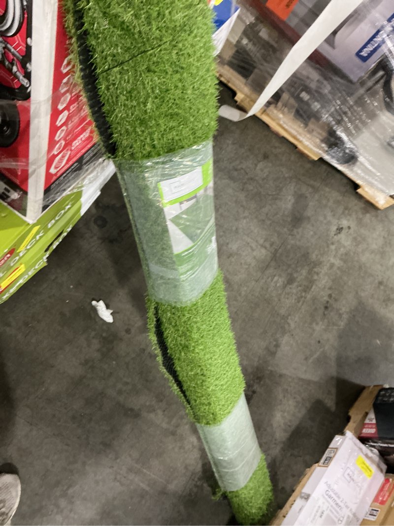 Condition photo showing Good Condition for mainstays 5'x7' green faux grass outdoor rug