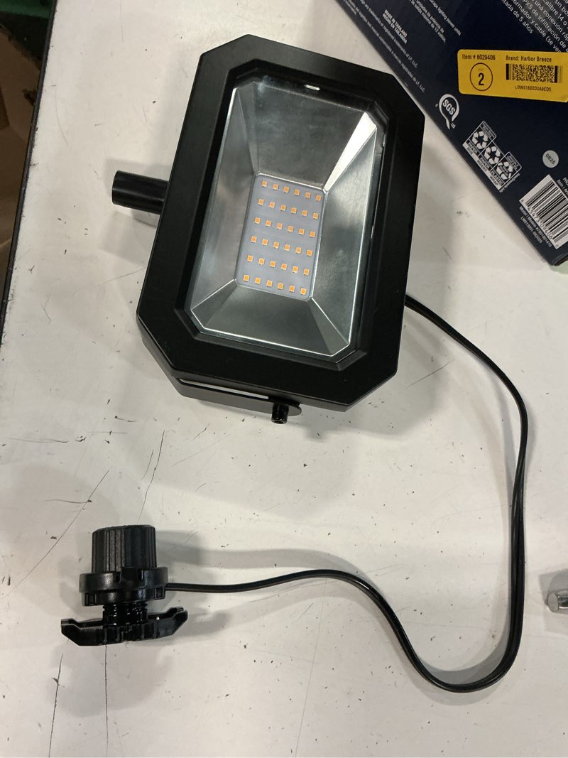 Condition photo showing As Is for harbor breeze flood light 2500 -lumens 25 -watt black low voltage cool white