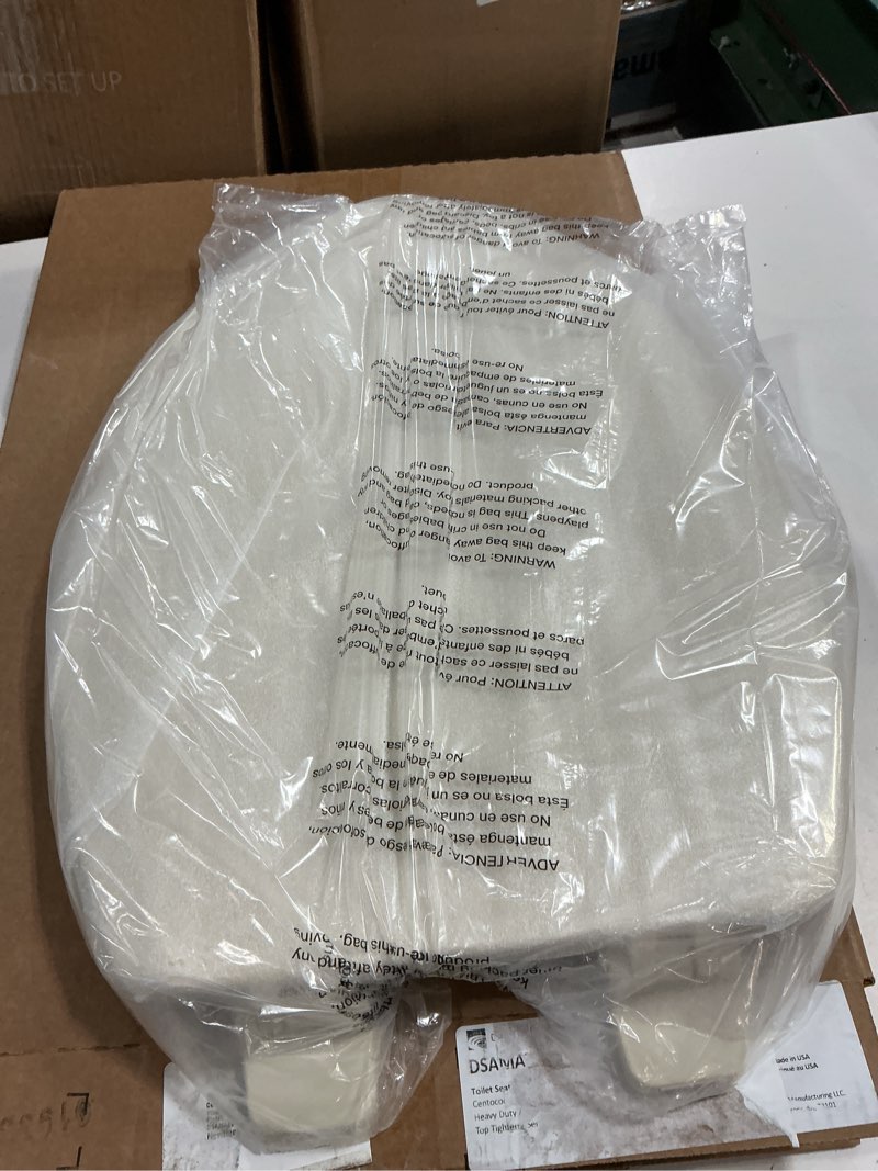 Condition photo showing New/Like New for centoco heavy-duty elongated toilet seat, wood core with scratch-resistant plastic finish, won't crack or fade, residential, made in the usa, dsamaz9-106, bone bone elongated standard / made in the usa