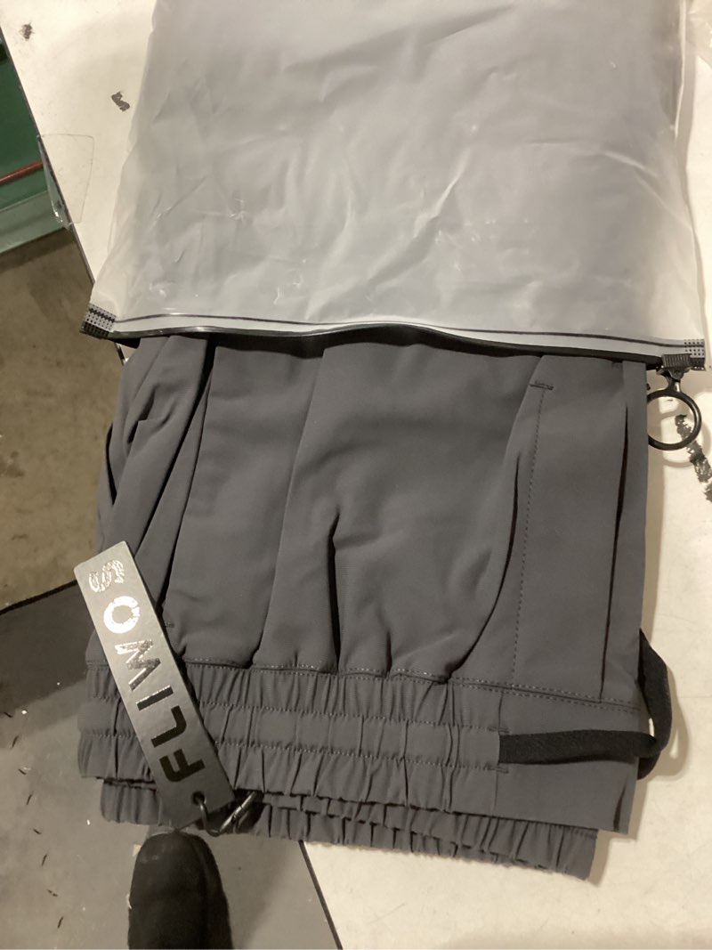 Condition photo showing Good Condition for Fliwos Men's Sweatpants, TriProof Stretch Track Pants with Zipper Pocket Drawstring Joggers Lightweight Pants Charcoal Gray Medium