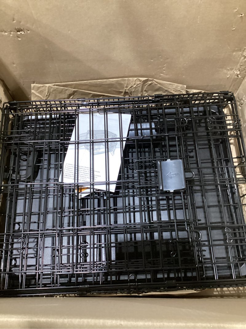 Condition photo showing Good Condition for Amazon Basics Durable, Foldable Metal Wire Small Dog Crate with Tray, Single Door, 24 x 18 x 20 in, Black 24 x 18 x 20 in Single Door w/ Divider