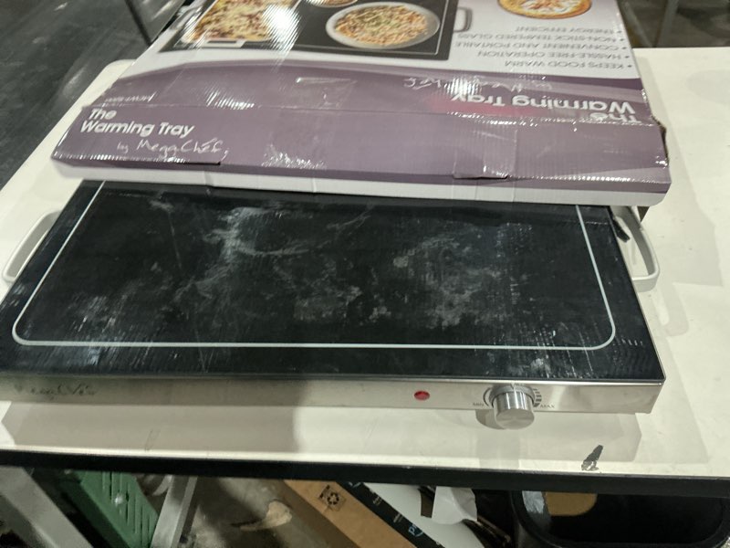 Condition photo showing As Is for megachef electric warming tray with adjustable temperature control, 24 in, silver, black