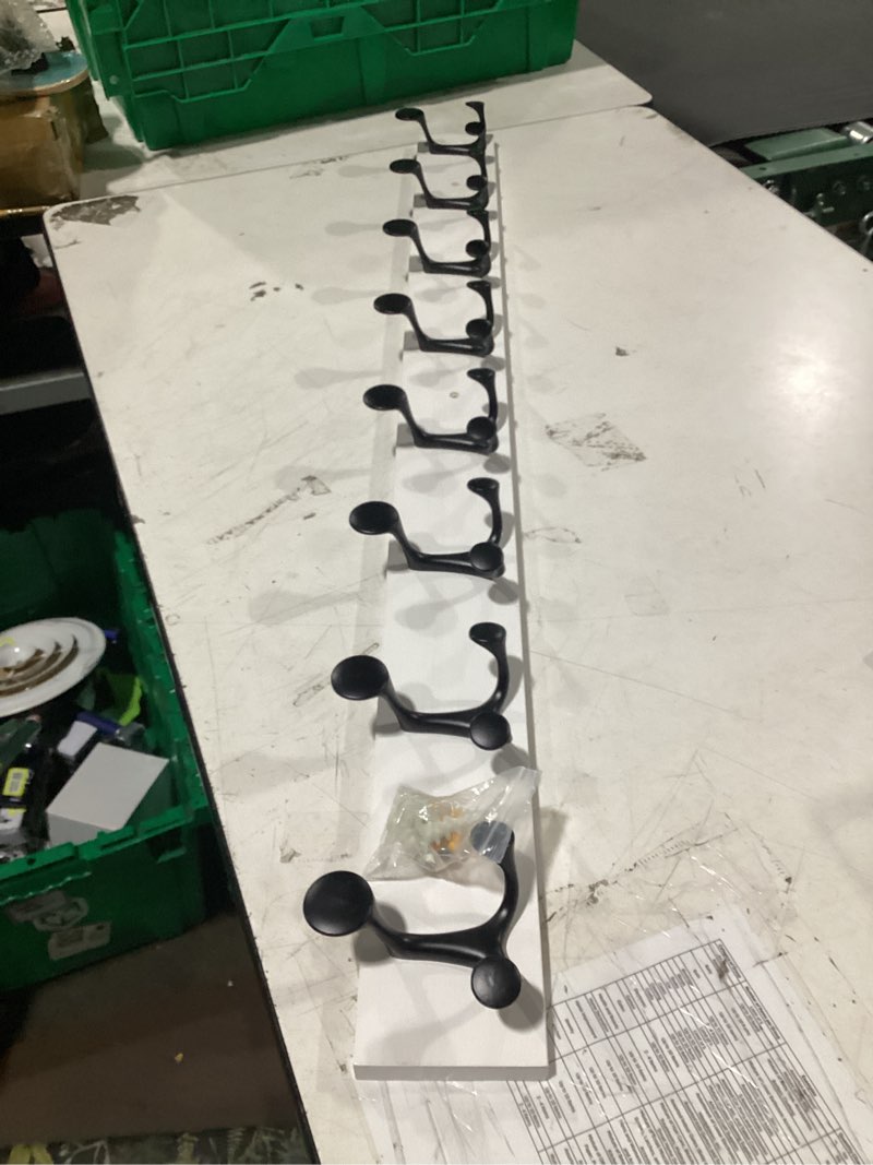 Condition photo showing Good Condition for skoloo 43-inch white wood coat rack wall mount with 8 triple hooks - ideal for family entrances, classrooms, and pet supplies storage - perfect coat hooks for wall, pack of 2 white 43 inch 2