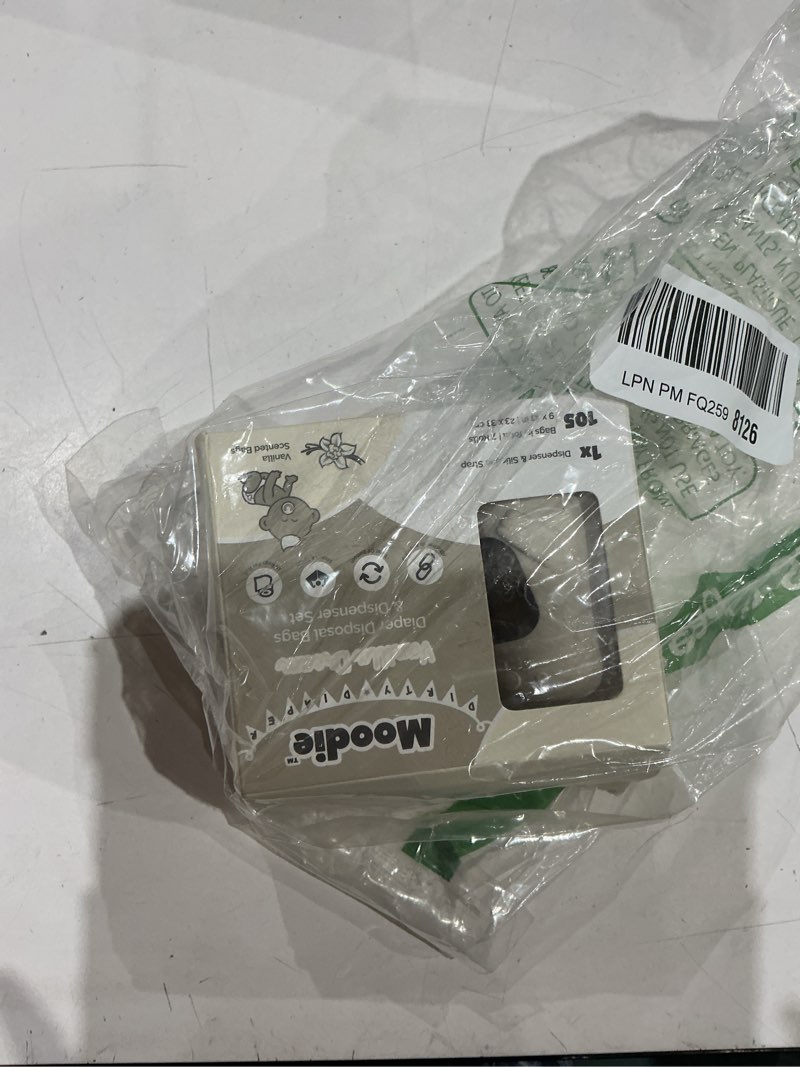 Condition photo showing New/Like New for moodie disposable diaper bags dispenser combo pack | 105 vanilla scented baby poop bags total | dirty diaper trash bags | diaper bags disposable (vanilla dream)