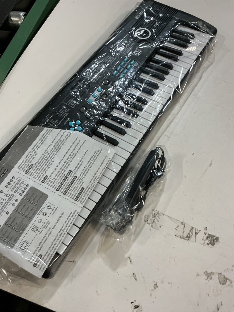Condition photo showing New/Like New for kids keyboard piano, 61 keys electric piano keyboard for kids with microphone mp3 function led display educational musical toys birthday xmas gifts for toddlers boys girls ages 3 5 7 9 12