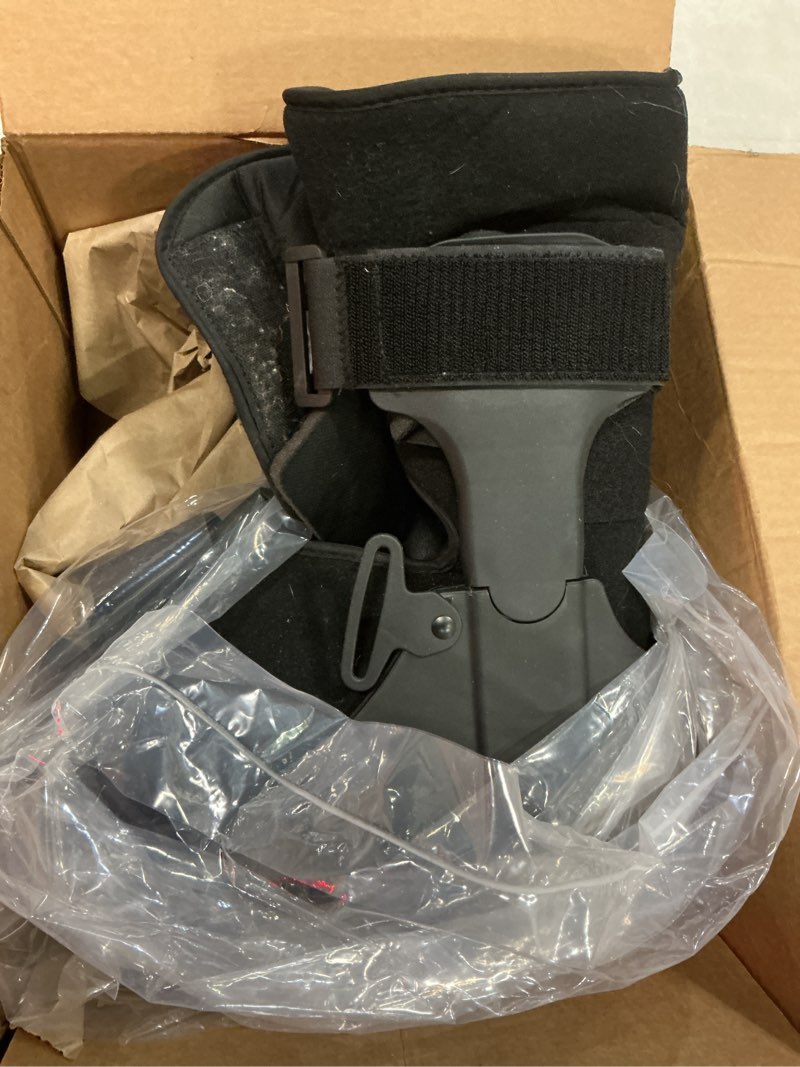 Condition photo showing As Is for united ortho usa14115 short air cam walker fracture boot, medium, black