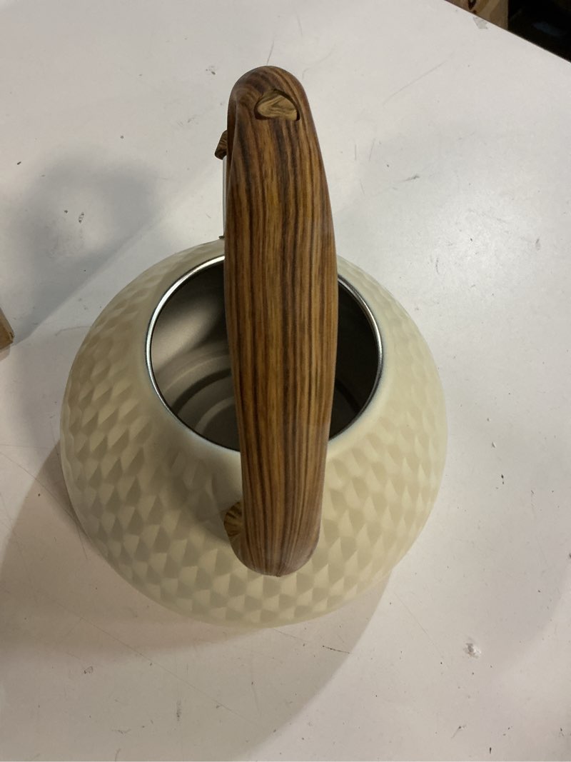 Condition photo showing As Is for Tea Kettle, 2.7 Quart with Wood Pattern Handle Loud Whistle Food Grade Stainless Steel Teapot, Anti-Hot Handle and Anti-Rust, Suitable for All Heat Sources Cream white