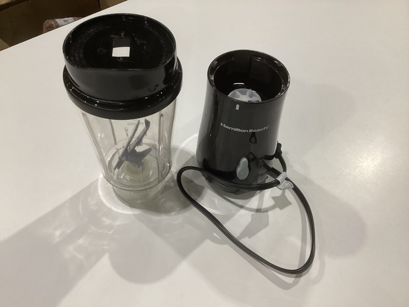 Condition photo showing As Is for Hamilton Beach Portable for Shakes and Smoothies, 14 Oz BPA Free Travel Cup & Lid, Durable Stainless Steel Blades, Personal Smoothie, Black (51101AG) Black Portable Blender, NOT TESTED