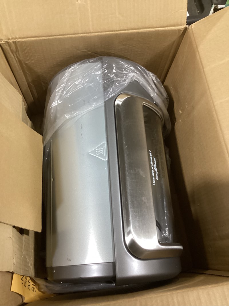 Condition photo showing As Is for Hamilton Beach Easy Reach 4-Slice Countertop Toaster Oven With Roll-Top Door, 1200 Watts, Fits 9” Pizza, 3 Cooking Functions for Bake, Broil and Toast, Silver (31344DA) Silver 4-Slice