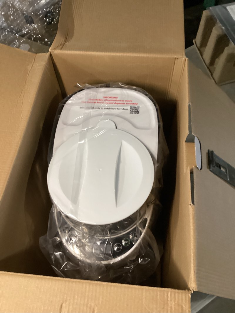 Condition photo showing New/Like New for baby brezza new and improved formula pro advanced formula dispenser machine - automatically mix a warm formula bottle instantly - easily make bottle with automatic powder blending, white